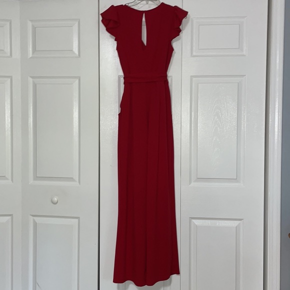 Red Jumpsuit with belted waist and ruffle sleeves - Picture 2 of 7